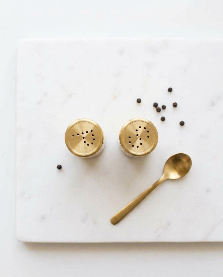 Salt and pepper shakers — Minimalist Culinary Flat Lay | Generated by Modelize