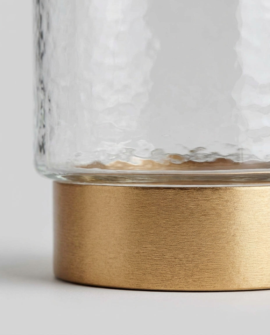 Decorative glass canisters with metallic accents — Material Detail Close-up | Generated by Modelize