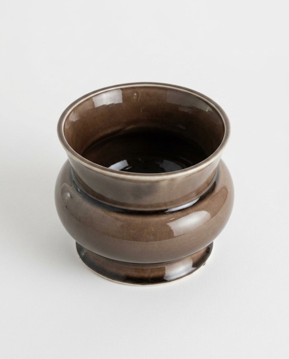 Ceramic vessel — Top-Down Studio Angle | Generated by Modelize