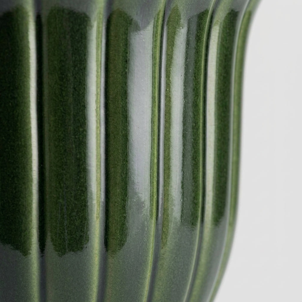Ceramic fluted planter — Glaze and Texture Close-up | Generated by Modelize
