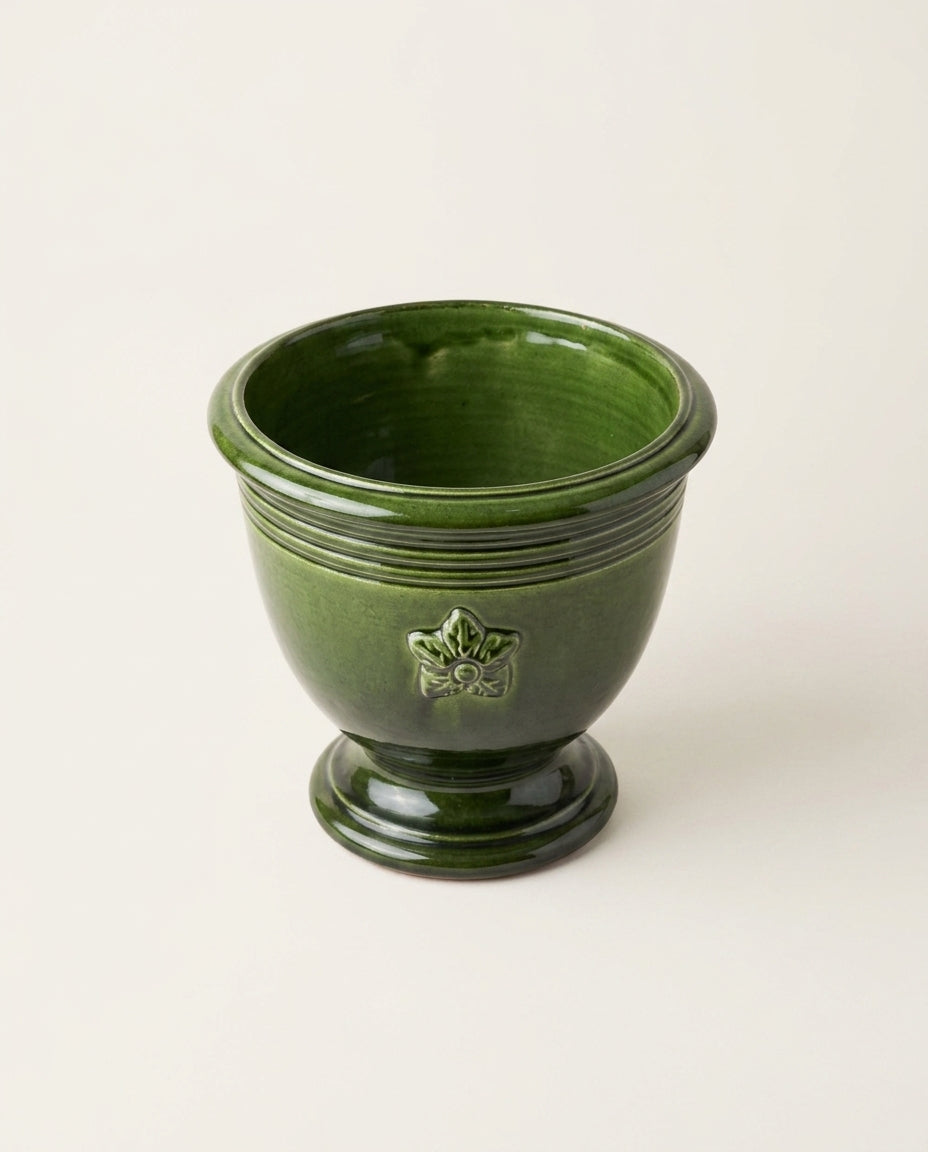 Footed ceramic planter — Elevated Studio Angle | Generated by Modelize